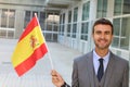 Proud man waving the Spanish flag Royalty Free Stock Photo