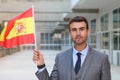 Proud man waving the Spanish flag Royalty Free Stock Photo