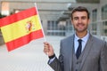 Proud man waving the Spanish flag Royalty Free Stock Photo