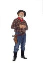 Proud Old West cowboy stands with hands clasped Royalty Free Stock Photo