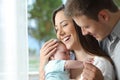Proud parents holding their baby Royalty Free Stock Photo