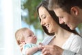 Proud parents playing with their baby Royalty Free Stock Photo