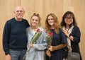 Proud seventy-three year-old grandfather & sixty-three year-old step grandmother with granddaughters after a dance performance.