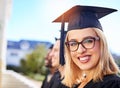 Proud to be graduating. Defocused shot of students on graduation day. Royalty Free Stock Photo