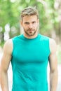 Proud to be strong. Man sporty outfit looks confident outdoors nature background. Guy bearded muscular body proud of his Royalty Free Stock Photo