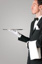 Proud waiter serving with tray Royalty Free Stock Photo