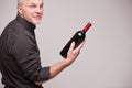 Proud wine maker man with a bottle Royalty Free Stock Photo