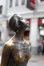 Proud woman bronze statue