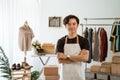 Proud young online ecommerce shop owner standing at his office Royalty Free Stock Photo