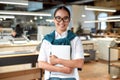 Prove yourself in every move. Confident asian female office worker posing indoors