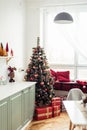 Provencal Kitchen Interior with Christmas Decor. Christmas Tree in Kitchen Near Big Window Royalty Free Stock Photo