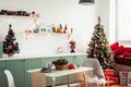 Provencal Kitchen Interior. Christmas tree is Decorated with Red Toy Balls. Selective Focus Royalty Free Stock Photo