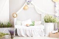 Provence style, rustic style! Shabby chic interior girly Provencal-style bedroom. Vintage room interior with white wrought-iron be