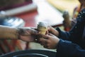 Providing free food to the poor Volunteers scooping out food to give charity to those who are hungry Royalty Free Stock Photo