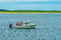 Provincetown, Cape Cod, Massachusetts, US - August 15, 2017 Boat and his crewlooking for a whale