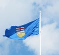 Provincial Flag Of Alberta Waving In The Breeze