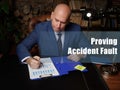 Proving Accident Fault phrase on the black chalkboard