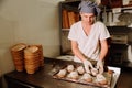 Proving dough of bran in basket. Private Bakery. Production bread.