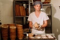 Proving dough of bran in basket. Private Bakery. Production bread. Royalty Free Stock Photo