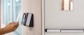 Proximity card door unlock, Hand security man using fingerprint scan on ID card reader access control system for identity