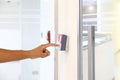 Proximity card reader door unlock, Close up hand security man using fingerprint scanning on access control system for identity