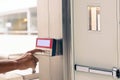 Proximity card reader door unlock, Hand security man press button on ID Card fingerprint scanning access control system for