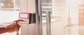 Proximity card reader door unlock, Hand security man press button on ID Card fingerprint scanning access control system for