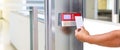 Proximity card reader door unlock, Hand security man using ID card on fingerprint scanning access control system for identity