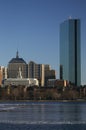 Prudential Building and Boston Skyline in winter on half frozen Charles River, Massachusetts, USA Royalty Free Stock Photo