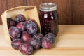 Prune plums with jar of jam Royalty Free Stock Photo