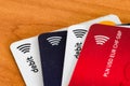 Logos of MasterCard PayPass and Visa payWave on credit cards