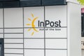 Logo and sign of InPost on InPost Paczkomat parcel locker