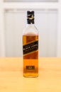 Opened bottle of Johnnie Walker Black Label Scotch whisky.