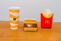 McDonald`s Big Mac menu with french fries, ketchup and Coca-Cola drink in a McDonald`s restaurant Royalty Free Stock Photo