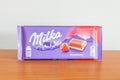 Milka alpine milk chocolate bar with strawberry Royalty Free Stock Photo
