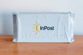 Pack with InPost logo and sign. InPost is private logistic operator in Poland
