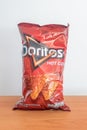 Doritos Nacho Hot Corn Chips. Flavored tortilla chips produced since 1964 by Frito-Lay, a subsidiary of PepsiCo