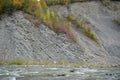 Prut river, autumn trees and geological mountain folds in Yaremche City, Ukraine