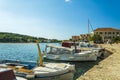 PRVIC, CROATIA,SEPTEMBER 29, 2017: tourist take a walk on the Zlarin marina in the middle of the sailboat.