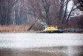 Pryluky, Chernihiv / Ukraine - 11/19/2020: Amphibious Excavators. River Cleaning
