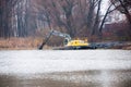 Pryluky, Chernihiv / Ukraine - 11/19/2020: Amphibious Excavators. River Cleaning