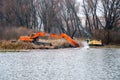 Pryluky, Chernihiv, Ukraine - 11/19/2020: Amphibious Excavators. River Cleaning
