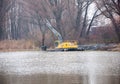 Pryluky, Chernihiv, Ukraine - 11/19/2020: Amphibious Excavators. River Cleaning.