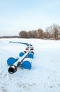 Pryluky, Chernihiv, Ukraine - 01/19/2021: Dredging machine on a frozen winter river