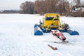 Pryluky, Chernihiv, Ukraine - 01/19/2021: Dredging machine on a frozen winter river