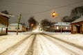 Pryluky, Chernihiv, Ukraine - 02/15/2021: Snow-covered evening streets of a small Eastern European town
