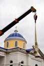 Installation of stone sculptures using a crane