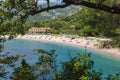 PRZNO, BUDVA RIVIERA AREA, MONTENEGRO, AUGUST 2, 2014: Panoramic view on the elite beach in small lagoon near Przno