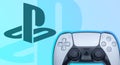 PS5 gamepad banner with blue background and playstation logo. Black and white playstation 5 controller with colored branding on Royalty Free Stock Photo