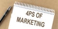 4PS OF MARKETING text on sticky note on a cork board with pencil